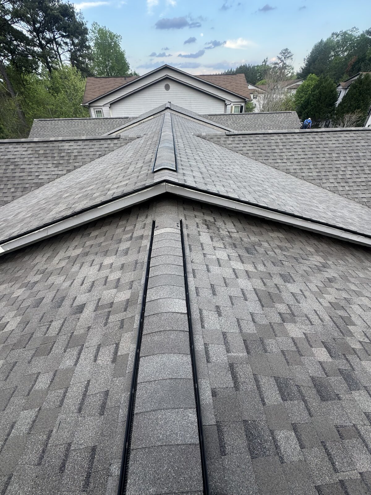 New architectural shingle roof with ridge vent and valleys